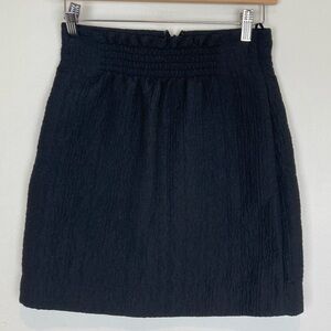 COS black textured mini skirt. Size 32 EUR